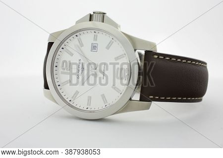 Tokyo, Japan 01.10.2020 - Longines Mens Wrist Watch Isolated On White. Date Function Indicating 19. 