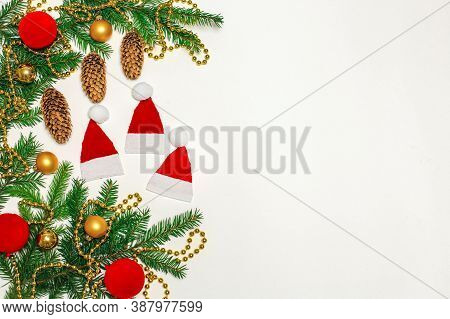 Christmas Composition, Gifts, Fir Branches, Cones, Toys. Decorations On A White Background