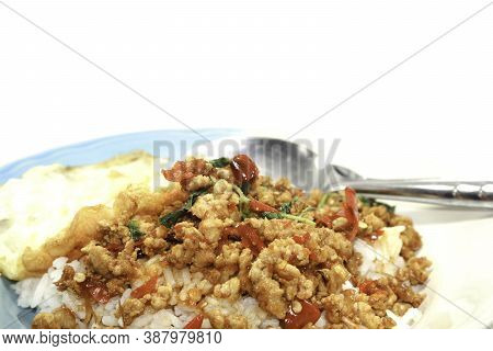 Rice With Basil, Minced Pork, Fried Egg, Delicious And Spicy Thai Food Is Popular All Over The World