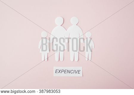 Paper Family Cut Out On Bright Pink Background, Family Home, Foster Care, Family Mental Health, Budg