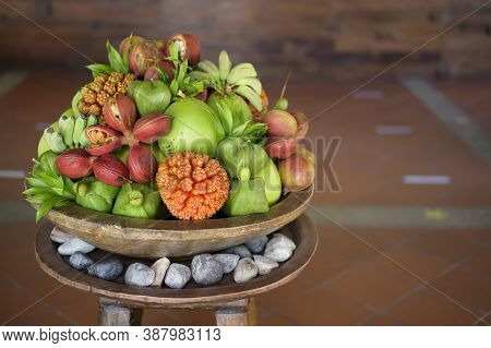 A View Of Various Exotic Fruit Presented At Reception Desk Of Hotel.