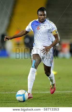 BARCELONA - DEC, 30: Cape Verdean player Marco Soares in action during the friendly match between Catalonia and Cape Verde at Olympic Stadium on December 30, 2013 in Barcelona, Spain