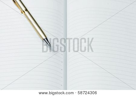pen and open notepad
