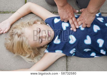 Young Child Receiving First Aid