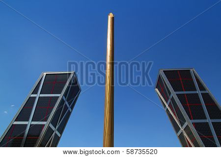 MADRID, SPAIN - JULY 23, 2010: Puerta de Europa or Torres KIO towers from 1996 with 114 meters high are inclined 15 degrees from the vertical, located in Plaza Castilla of Madrid, July 23, 2010.