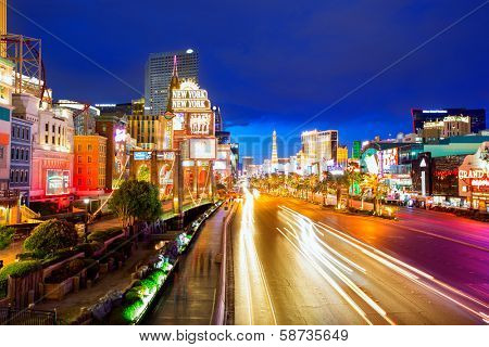 LAS VEGAS - APRIL 17, 2013: Sunset view of the famous Strip from high angle with night lights in Las Vegas, Nevada, April 17, 2013