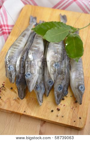 Raw ice fish on a cutting board