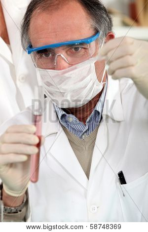 doctor analysing test-tube