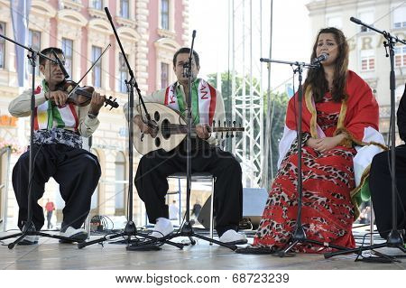 ZAGREB, CROATIA - JULY 18: Members of folk group Payiz from Sulaimaniya, Kurdistan, Iraq during the 48th International Folklore Festival in center of Zagreb, Croatia on July 18, 2014