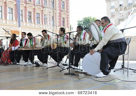 ZAGREB, CROATIA - JULY 18: Members of folk group Payiz from Sulaimaniya, Kurdistan, Iraq during the 48th International Folklore Festival in center of Zagreb, Croatia on July 18, 2014