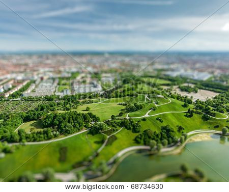 Aerial view of Olympiapark and Munich from Olympiaturm (Olympic Tower) with tilt shift toy effect shallow depth of field. Munich, Bavaria, Germany