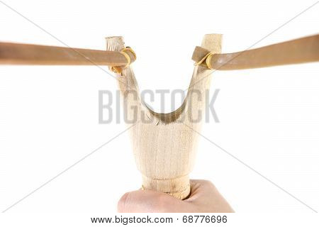 Catapult Slingshot Isolated On White Background With Kid Hand Pulling