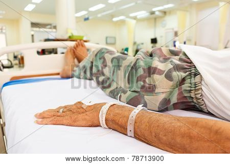 Patient Lie On Bed In Emergency Room