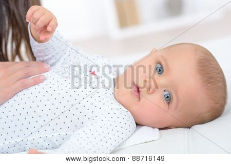 Baby lying on its back