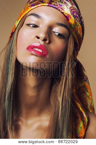 beauty young afro american woman in shawl on head smiling close