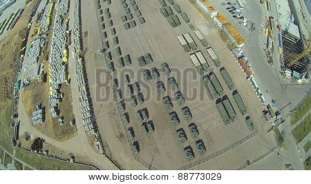 MOSCOW, RUSSIA - APRIL 20, 2014: Tanks and military vehicles is parked at Khodynskoe Field prepared for the parade of victory, aerial view