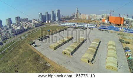 MOSCOW, RUSSIA - APRIL 20, 2014: Hodynskoe field with military equipment prepared for the parade of victory and alley Pilots heroes, aerial view