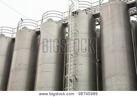 Metal Tower Silos Of The Industrial Plant