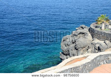 Turquoise bay and volcanic cliffs in Callao Salvaje on Tenerife, Spain