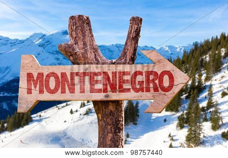Montenegro wooden sign with winter background