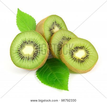 Sliced kiwi fruit with leafs on white background