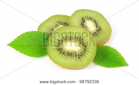 Slices of kiwi with leafs on white background