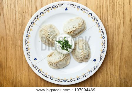Dumplings, Manti - traditional meat dish of Central Asia, Turkey, Mongolia, Korea