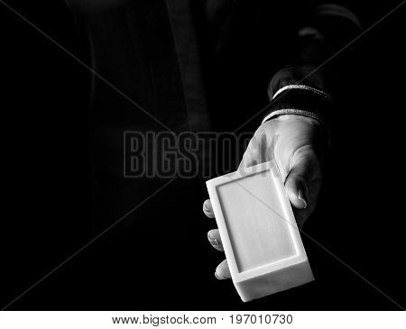 Woman Hand Isolated On Black Showing Bar Of Soap