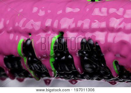 Black Corn With Pouring Green And Purple Paint Background, Macro Closeup.texture.abstract