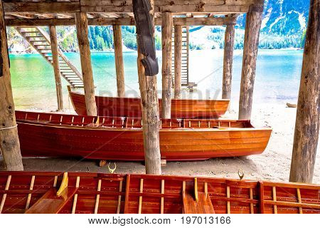 Wooden Boats Under Boat House On Braies Lake