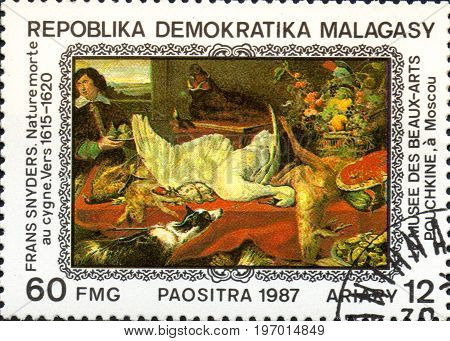 UKRAINE - CIRCA 2017: A postage stamp printed in Madagascar shows Frans Snyders: Still Life with Swan 1615-1620 from series Paintings from Pushkin-Museum Moscow circa 1987