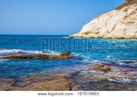 The north of Israel. The grottoes of Rosh Ha Nikra on the Mediterranean coast. Geological phenomenon on the border with Lebanon. Rocks of white limestone form caves, arches and grottoes
