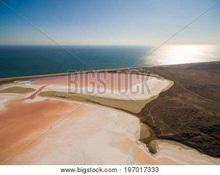 Aerial shot of Koyashskoe pink salt lake firth in Crimea