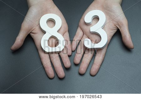To Female Hands The Figure Of Eighty-three.