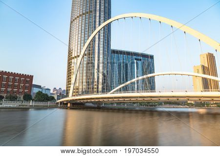 Tianjin city waterfront downtown skyline with Haihe river,China.