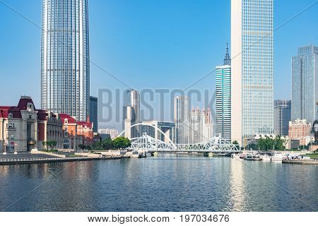 Tianjin city waterfront downtown skyline with Haihe river,China.