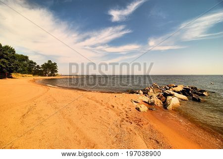 The red sandy beach of Sandy Point State Park near Annapolis, Maryland