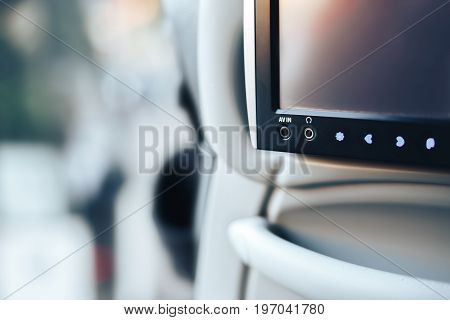 Long-distance international bus of the raised comfort with built in seat chair, a TV or a tablet where they can watch movies during road and listen to music, surf the Internet