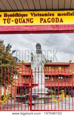 Montreal, Canada - May 26, 2017: Buddhist Temple Entrance And Tu Quang Pagoda Sign In City In Quebec