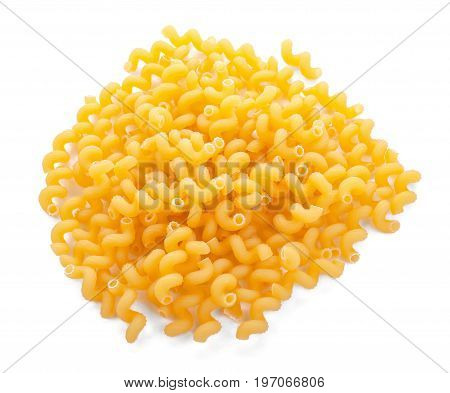 Beautiful uncooked macaroni isolated on a white background. Dry macaroni pasta. A view from from above on the organized cavatappi pasta. Traditional and vegan pasta recipes.