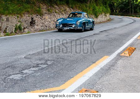 GOLA DEL FURLO, ITALY - MAY 19:MERCEDES-BENZ 300 SL COUPÉ W 198 LEICHTBAU 1955 on an old racing car in rally Mille Miglia 2017 the famous italian historical race (1927-1957) on May 19 2017