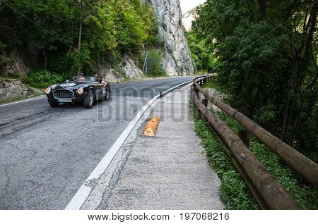 GOLA DEL FURLO, ITALY - MAY 19: FERRARI 225 S SPIDER VIGNALE 1952 on an old racing car in rally Mille Miglia 2017 the famous italian historical race (1927-1957) on May 19 2017