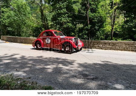 GOLA DEL FURLO, ITALY - MAY 19:FIAT 508 CS MM BERLINETTA 1935 on an old racing car in rally Mille Miglia 2017 the famous italian historical race (1927-1957) on May 19 2017