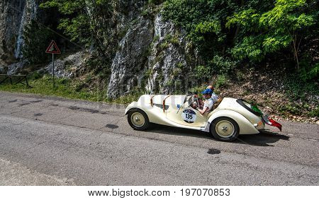 GOLA DEL FURLO, ITALY - MAY 19: BMW 328 1939 on an old racing car in rally Mille Miglia 2017 the famous italian historical race (1927-1957) on May 19 2017