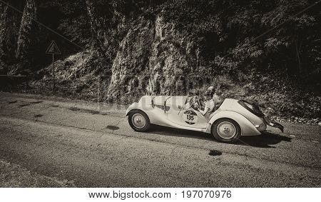 GOLA DEL FURLO, ITALY - MAY 19: BMW 328 1939 on an old racing car in rally Mille Miglia 2017 the famous italian historical race (1927-1957) on May 19 2017