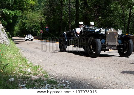 GOLA DEL FURLO, ITALY - MAY 19: LANCIA LAMBDA TIPO 221 SPIDER CASARO 1929 on an old racing car in rally Mille Miglia 2017 the famous italian historical race (1927-1957) on May 19 2017