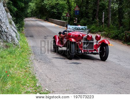 GOLA DEL FURLO, ITALY - MAY 19: ALFA ROMEO 6C 1750 GRAN SPORT 1930 on an old racing car in rally Mille Miglia 2017 the famous italian historical race (1927-1957) on May 19 2017