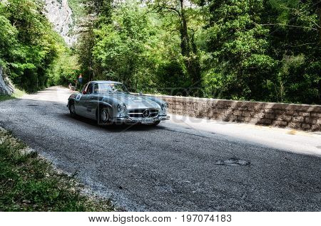 GOLA DEL FURLO, ITALY - MAY 19: MERCEDES-BENZ 300 SL COUPÉ W 198 1955 on an old racing car in rally Mille Miglia 2017 the famous italian historical race (1927-1957) on May 19 2017