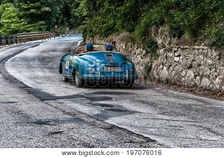 GOLA DEL FURLO, ITALY - MAY 19: PORSCHE 356 1500 SPEEDSTER 1954 on an old racing car in rally Mille Miglia 2017 the famous italian historical race (1927-1957) on May 19 2017