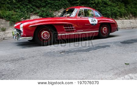 GOLA DEL FURLO, ITALY - MAY 19: MERCEDES-BENZ 300 SL COUPÉ W 198 1955 on an old racing car in rally Mille Miglia 2017 the famous italian historical race (1927-1957) on May 19 2017
